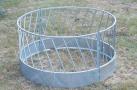 Circular feeder for sheep with diagonal rails